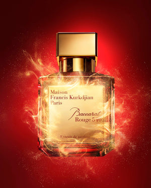Maison Francis Kurkdjian Baccarat Rouge 540 perfume bottle on a red background