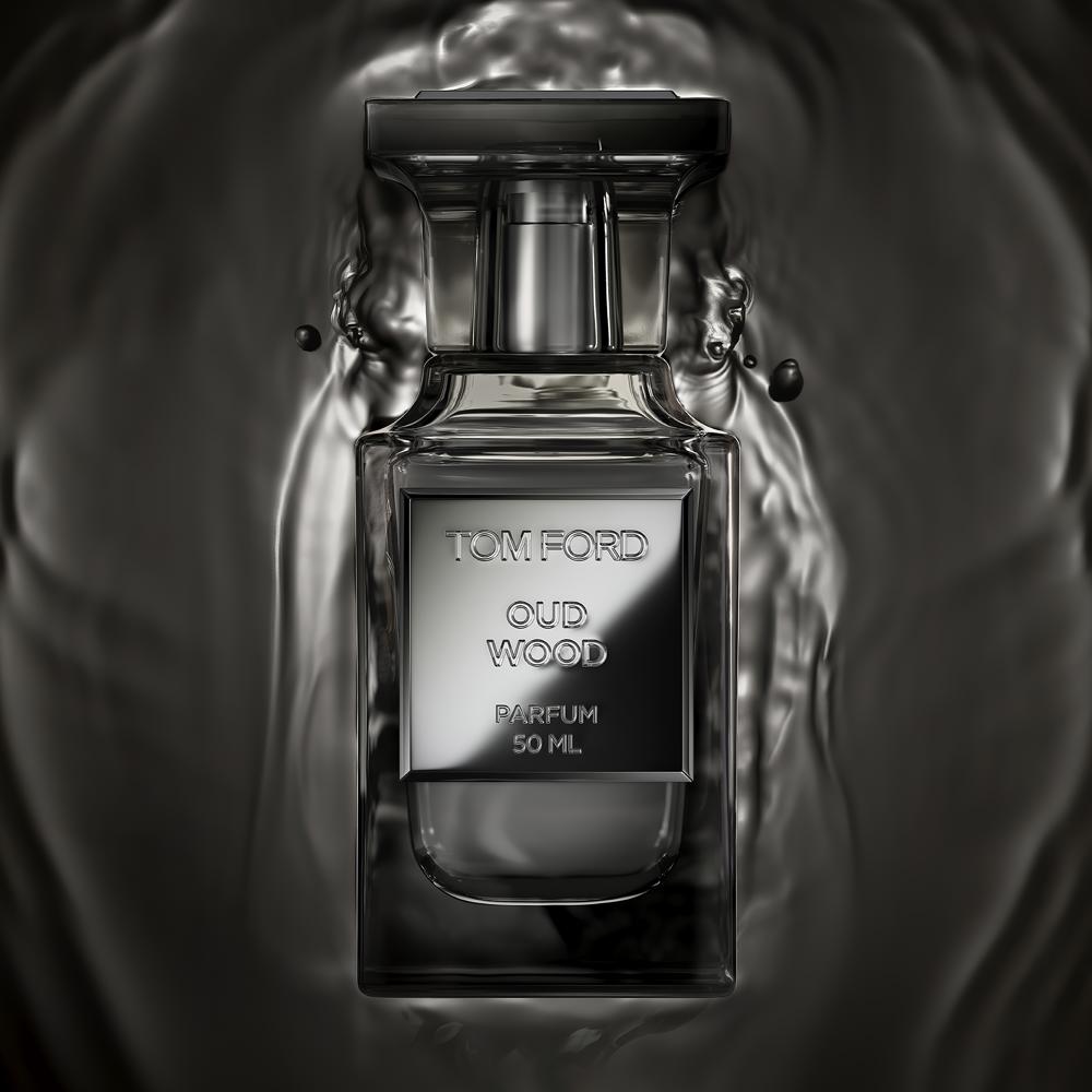 Tom Ford Oud Wood parfum bottle on a dark background