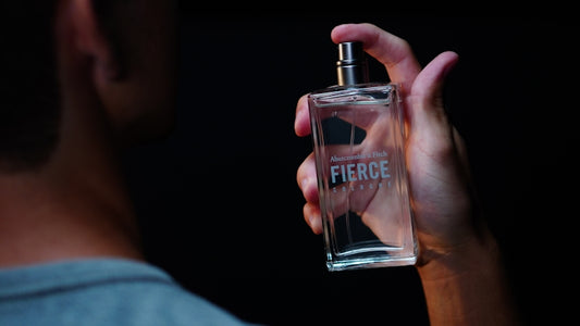 A man sprays fierce perfume.