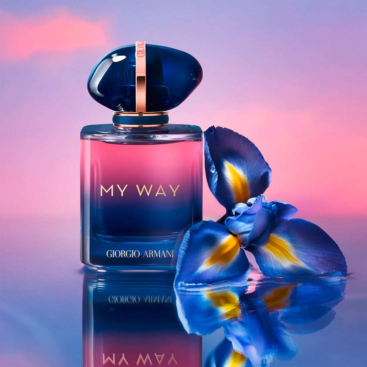 Giorgio Armani 'My Way' perfume bottle with blue flowers on a reflective surface
