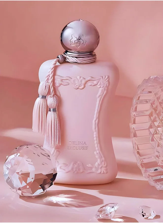 delina exclusif Pink perfume bottle with decorative elements on a soft pink background