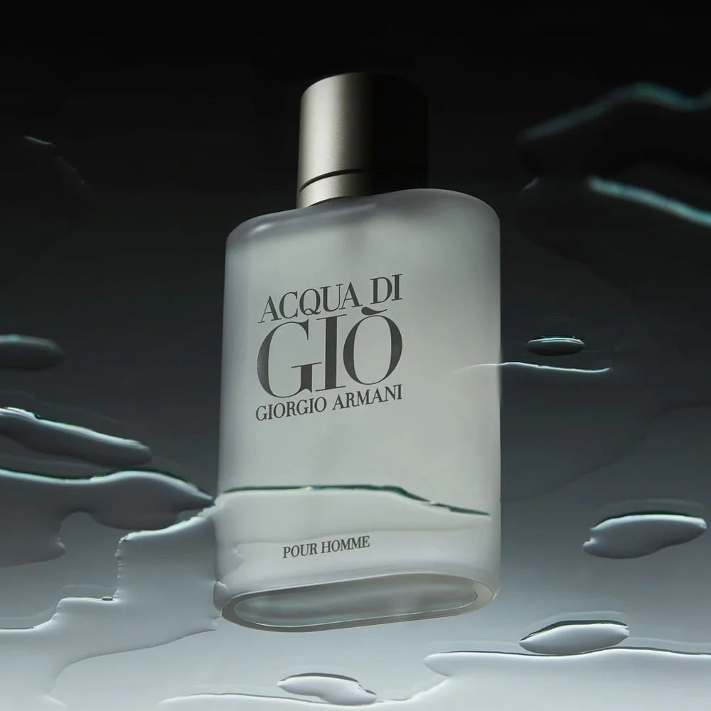 Acqua di Giò Giorgio Armani perfume bottle on a dark background
