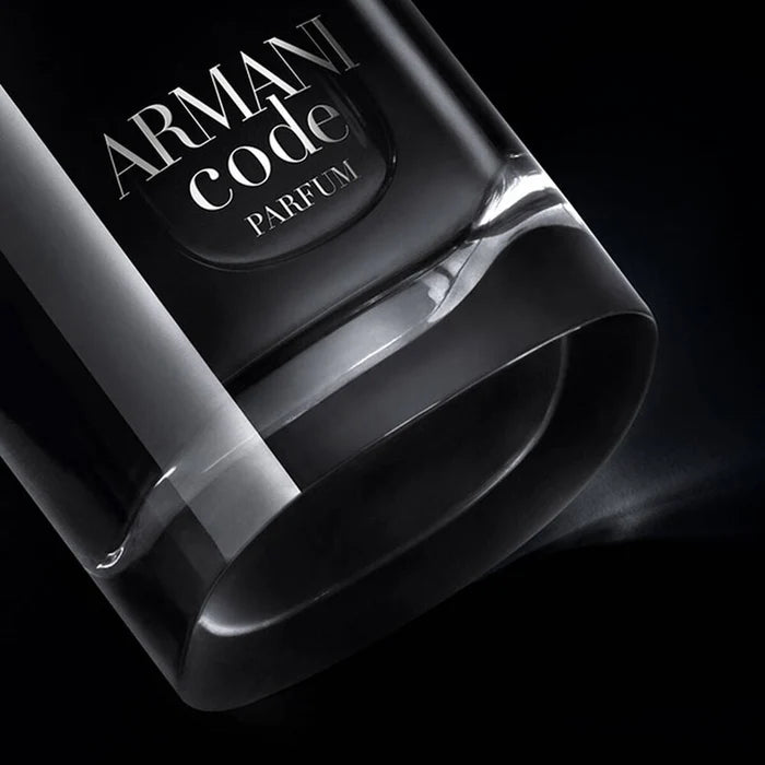 Armani Code Parfum bottle on a black background