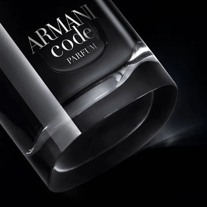 Armani Code Parfum bottle on a black background