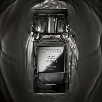 Tom Ford Oud Wood parfum bottle on a dark background